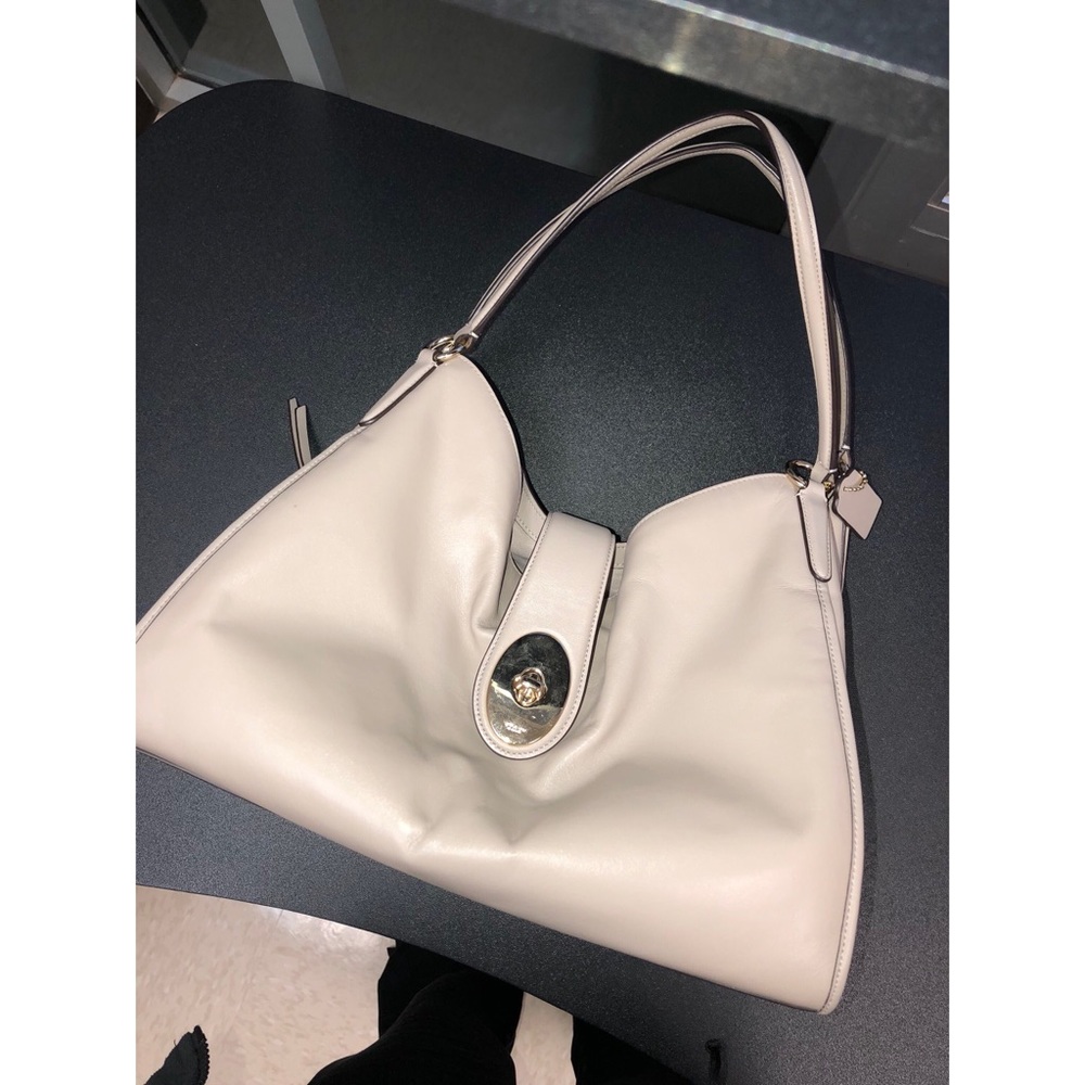 Coach leather beige hobo with buckle like new